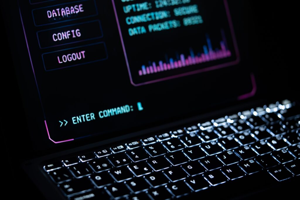 Close-up of a glowing laptop keypad with digital interface, representing futuristic technology.